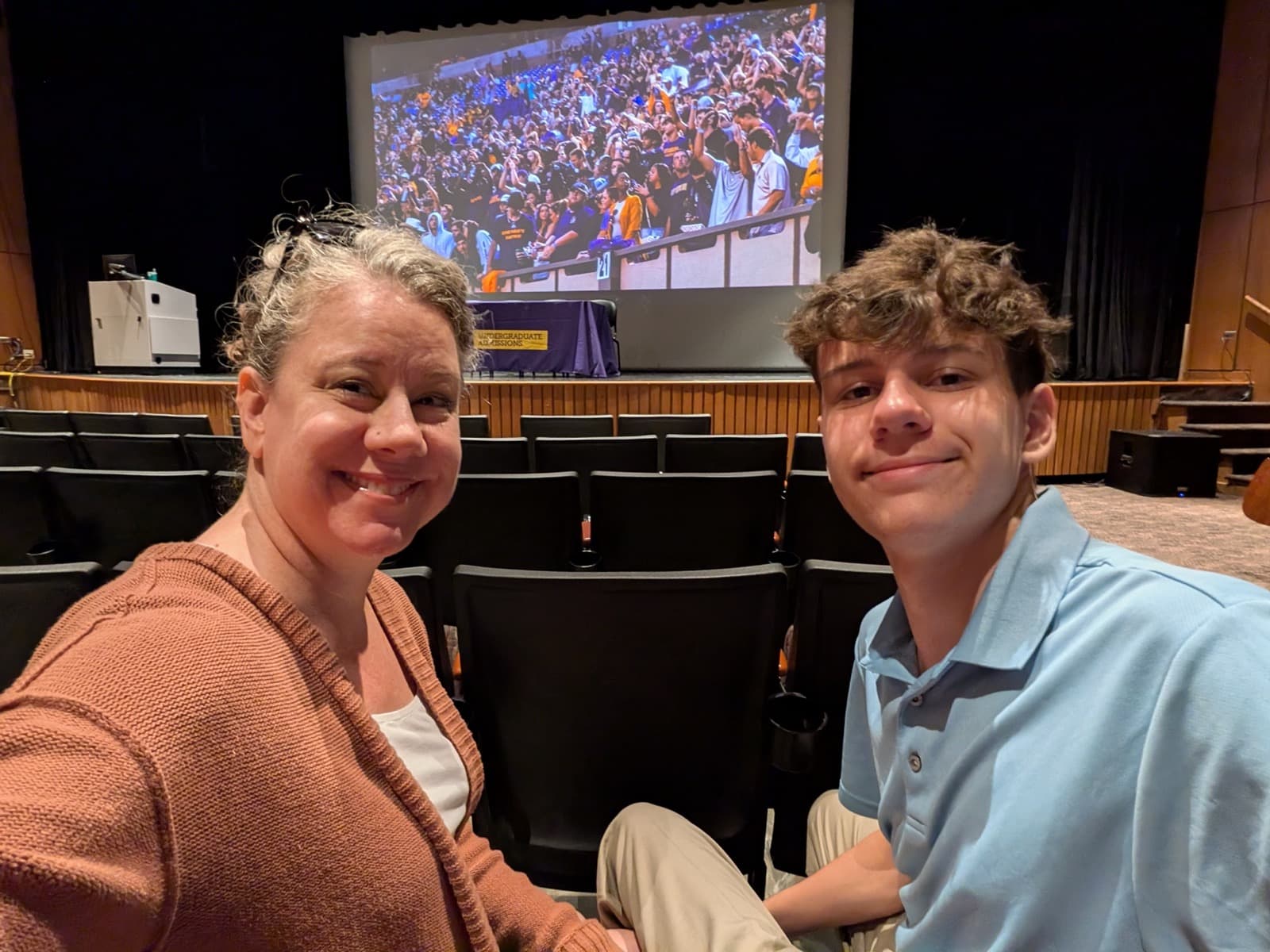 A parent and student at a university undergraduate admissions information session